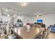 Open-concept dining area connects to the kitchen, providing ample space for dining and entertaining guests at 9009 Cat Tail Pond Rd, Summerville, SC 29485