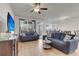Inviting living room with comfortable seating, modern entertainment center, and plenty of room for relaxation at 9009 Cat Tail Pond Rd, Summerville, SC 29485