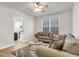 Comfortable living room featuring modern furnishings and wood-look floors for a welcoming atmosphere at 9009 Cat Tail Pond Rd, Summerville, SC 29485