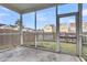 View from the screened in porch overlooking the backyard at 9009 Cat Tail Pond Rd, Summerville, SC 29485