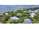 Picturesque neighborhood with mature trees offers a beautiful home with a private pool and stunning ocean views at 932 Middle St, Sullivans Island, SC 29482