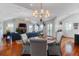 Spacious living area with hardwood floors, stylish furnishings, and an open layout connecting to the kitchen at 932 Middle St, Sullivans Island, SC 29482