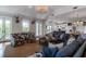 Spacious living room featuring hardwood floors, elegant decor, and an open concept design at 932 Middle St, Sullivans Island, SC 29482
