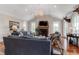 Elegant living room boasts a fireplace, modern lighting, and comfortable seating for relaxing and entertaining guests at 932 Middle St, Sullivans Island, SC 29482