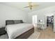 Neutral bedroom featuring a ceiling fan and a walk-in closet at 9815 Seed St, Ladson, SC 29456