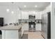Modern kitchen with stainless steel appliances, granite countertops, and ample cabinet space at 9815 Seed St, Ladson, SC 29456