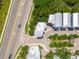An aerial view showcases the neighborhood with lush greenery and well-maintained homes along the main road at 992 Key Colony Ct, Mount Pleasant, SC 29464