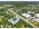 An aerial view showcasing the neighborhood with lush greenery and well-maintained homes, near the main road at 992 Key Colony Ct, Mount Pleasant, SC 29464