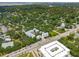 An aerial view showcasing the neighborhood with lush greenery and well-maintained homes, near the water at 992 Key Colony Ct, Mount Pleasant, SC 29464
