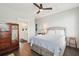 Spacious bedroom features a ceiling fan, an adjacent bathroom with stylish vanity and a bathroom at 992 Key Colony Ct, Mount Pleasant, SC 29464