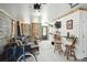 Finished garage space with entertainment area, stylish decor, shiplap accent wall, and access to the outdoors at 992 Key Colony Ct, Mount Pleasant, SC 29464