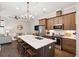 Open kitchen featuring a large island, stainless appliances, and seamless flow to living room at 992 Key Colony Ct, Mount Pleasant, SC 29464