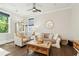 Well-lit living room with elegant furniture, hardwood floors, and stylish decor elements at 992 Key Colony Ct, Mount Pleasant, SC 29464