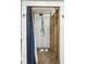 Open, modern shower featuring sleek fixtures, wood accents, and a stylish curtain for privacy at 992 Key Colony Ct, Mount Pleasant, SC 29464