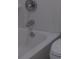 Close up of the bath and shower fixtures at 103 Ann St, Saint George, SC 29477