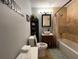 Bathroom featuring decorative shelves, a vanity, and a shower with tile surround at 104 Jackson Rd, Ladson, SC 29456