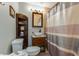 Bathroom featuring decorative shelves, a vanity, and a shower with tile surround at 104 Jackson Rd, Ladson, SC 29456