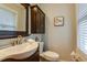 Stylish bathroom with a vessel sink, dark wood vanity, and modern fixtures at 104 Jackson Rd, Ladson, SC 29456