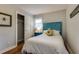 Bedroom features a decorative headboard, closet, and hardwood floors at 104 Jackson Rd, Ladson, SC 29456