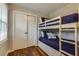 Bedroom featuring bunk beds and hardwood floors at 104 Jackson Rd, Ladson, SC 29456