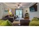 Inviting living room featuring hardwood floors, comfortable seating, and sliding glass doors to the outdoor area at 104 Jackson Rd, Ladson, SC 29456