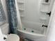 Clean bathroom with a tub and shower and seashell-themed decor at 106 Labrador Ct, Summerville, SC 29485