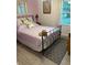 Charming bedroom featuring a decorative bed frame, complementary bedding, and natural light at 106 Labrador Ct, Summerville, SC 29485