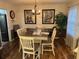 Bright dining room featuring a table with seating for six and charming decor at 106 Labrador Ct, Summerville, SC 29485