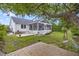 Spacious backyard featuring a screened porch, patio, and a swing, ideal for outdoor enjoyment at 1075 Wayfarer Ln, Charleston, SC 29412
