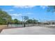 Community basketball court adjacent to a pool area, offering recreational opportunities for residents at 1075 Wayfarer Ln, Charleston, SC 29412