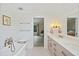 Elegant bathroom with a clawfoot tub, double vanity, and stylish fixtures, creating a relaxing and refined atmosphere at 1075 Wayfarer Ln, Charleston, SC 29412