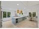 Bright, spacious kitchen features a large island, pendant lights, and an eat-in nook at 1075 Wayfarer Ln, Charleston, SC 29412