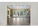 Bright living room featuring hardwood floors and access to an outdoor porch, perfect for relaxation and entertaining at 1075 Wayfarer Ln, Charleston, SC 29412
