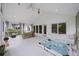 Covered patio featuring a relaxing hot tub, ceiling fan, and comfortable wicker furniture at 1075 Wayfarer Ln, Charleston, SC 29412