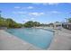 Large community swimming pool with ample seating and a clear blue sky at 1075 Wayfarer Ln, Charleston, SC 29412