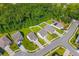 An aerial view shows well-maintained homes, green lawns, and tree-lined streets in a desirable neighborhood at 108 Rusting Link Rd, Summerville, SC 29483