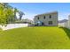 Expansive backyard featuring a lush lawn, privacy fence, and outdoor seating perfect for entertaining and relaxation at 108 Rusting Link Rd, Summerville, SC 29483