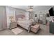 Comfortable bedroom with large window, soft carpet, chandelier, and ample natural light at 108 Rusting Link Rd, Summerville, SC 29483