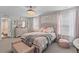 Charming bedroom featuring plush bedding, a stylish chandelier, and a soft, inviting ambiance at 108 Rusting Link Rd, Summerville, SC 29483