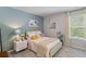 Bright bedroom featuring a neutral color scheme, natural light, and stylish decor for a cozy and relaxing ambiance at 108 Rusting Link Rd, Summerville, SC 29483