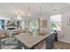 Bright eat-in kitchen with granite counters, stainless appliances, and backyard views at 108 Rusting Link Rd, Summerville, SC 29483