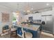 Stylish kitchen with granite countertops, stainless steel appliances, and an eat-in island with seating at 108 Rusting Link Rd, Summerville, SC 29483
