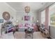 Cozy living room with decorative lighting, and plush seating, perfect for relaxing and entertaining at 108 Rusting Link Rd, Summerville, SC 29483