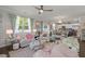 Inviting living room with an open layout, stylish décor, and seamless access to the kitchen at 108 Rusting Link Rd, Summerville, SC 29483