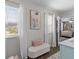 Cozy sitting area off of the bathroom with natural light and comfortable decor at 108 Rusting Link Rd, Summerville, SC 29483