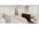 Stylish bedroom view showcasing decor, black dresser, and light-filled space at 109 Barker Street, Summerville, SC 29486