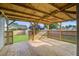 A backyard deck featuring lattice with backyard views, a wood ceiling and wood floor at 109 Dovetail Cir, Summerville, SC 29483