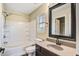 Well-lit bathroom with a shower-tub combo, stylish vanity, and modern fixtures at 109 Dovetail Cir, Summerville, SC 29483