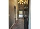 Inviting entryway with tile flooring leading to wood floors and sliding glass doors at 109 Dovetail Cir, Summerville, SC 29483