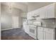 Charming kitchen with white cabinetry, granite countertops, and updated appliances at 109 Dovetail Cir, Summerville, SC 29483